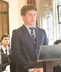 MAX JACOBSON '25 PRESENTS his findings to the board
